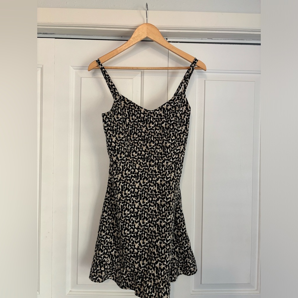 Leopard print dress with subtle ruffle bottom